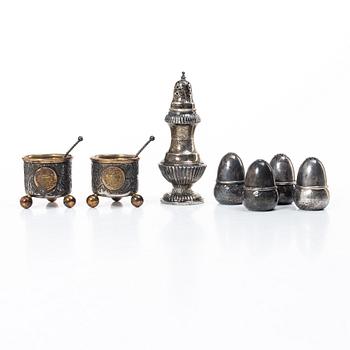Pair of silver salt cellars and five silver shakers, including C.G. Hallberg, Stockholm, 1918.