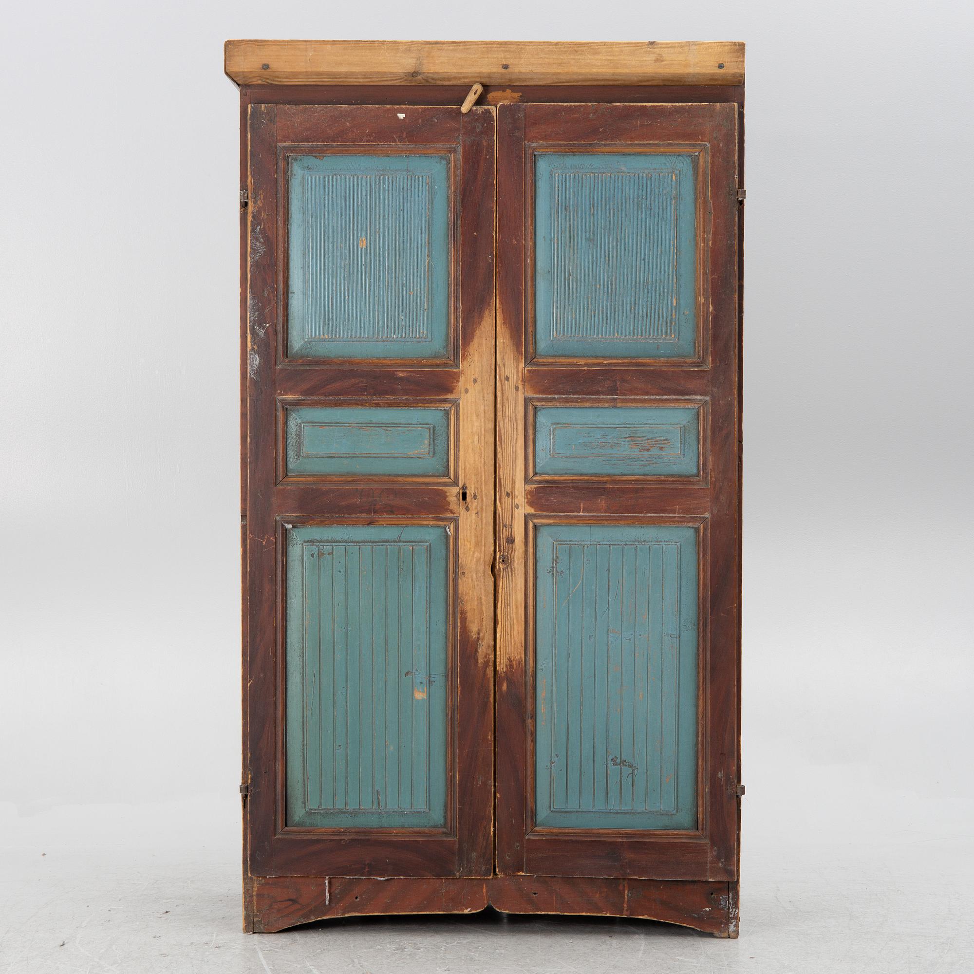 A Swedish wooden cabinet, 19th century.