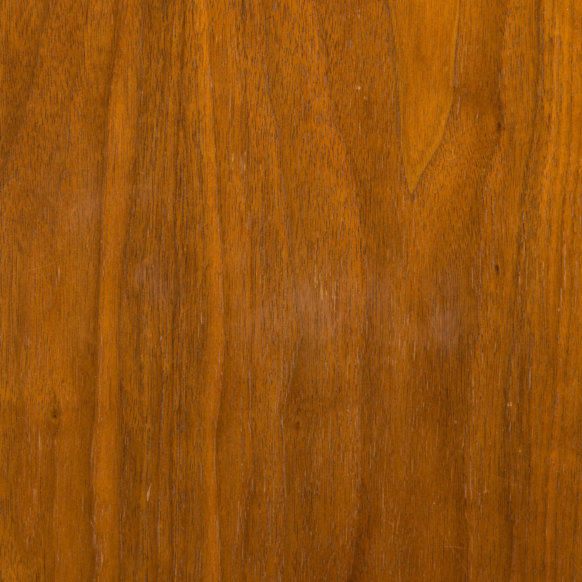 A 1960s teak and oak dining table.