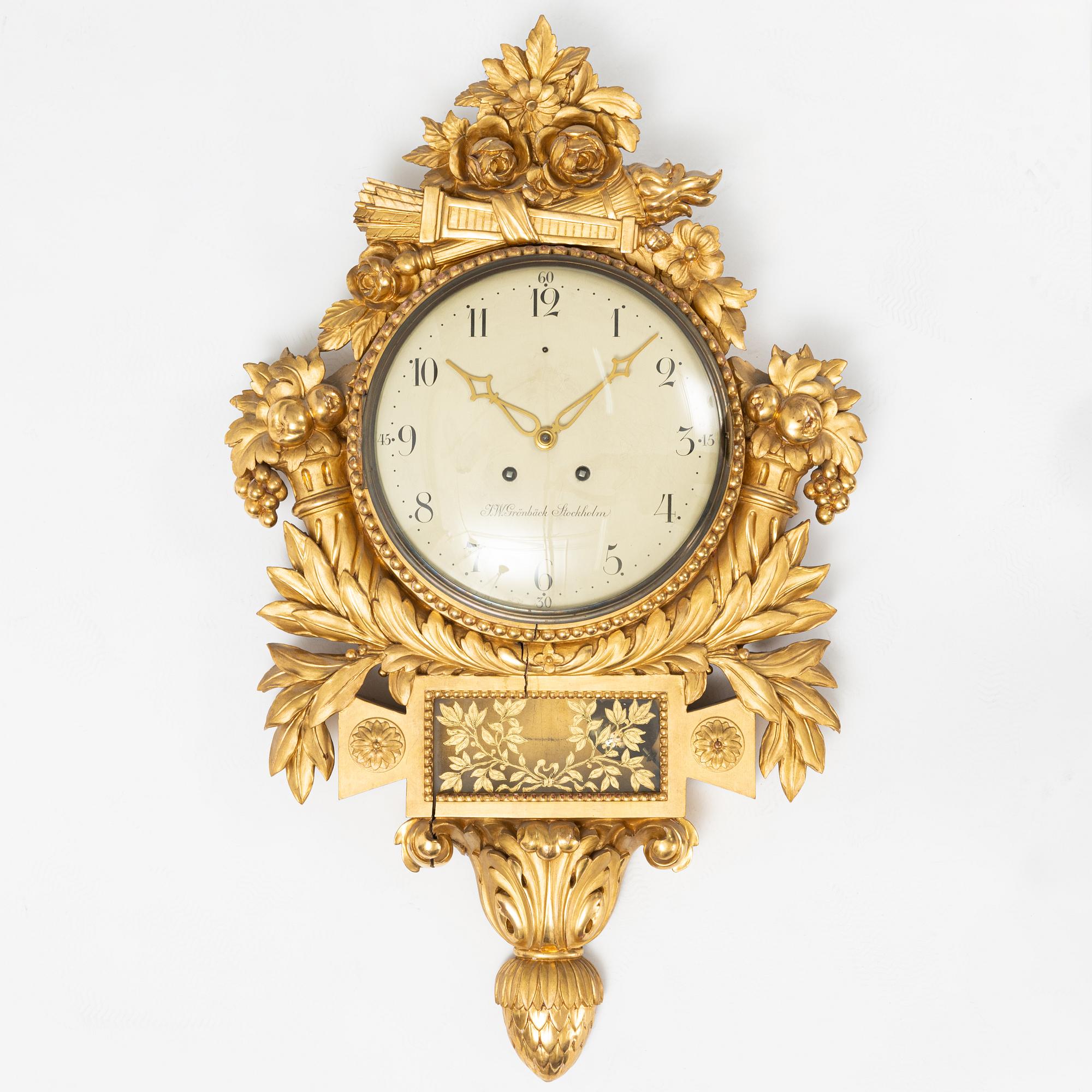 A Gustavian style wall clock, F.W. Grönbäck, Stockholm 1918.