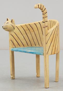 A Gérard Rigot painted wood child chair, France 1980's-90's.