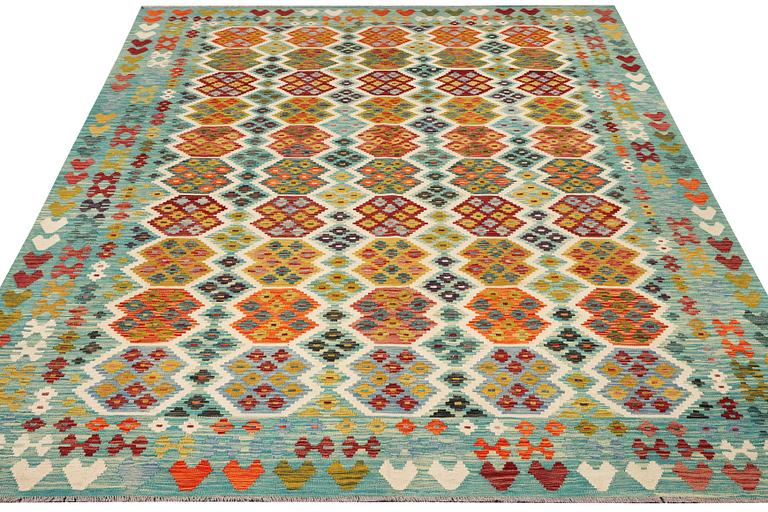 A Kilim carpet, c. 357 x 261 cm.