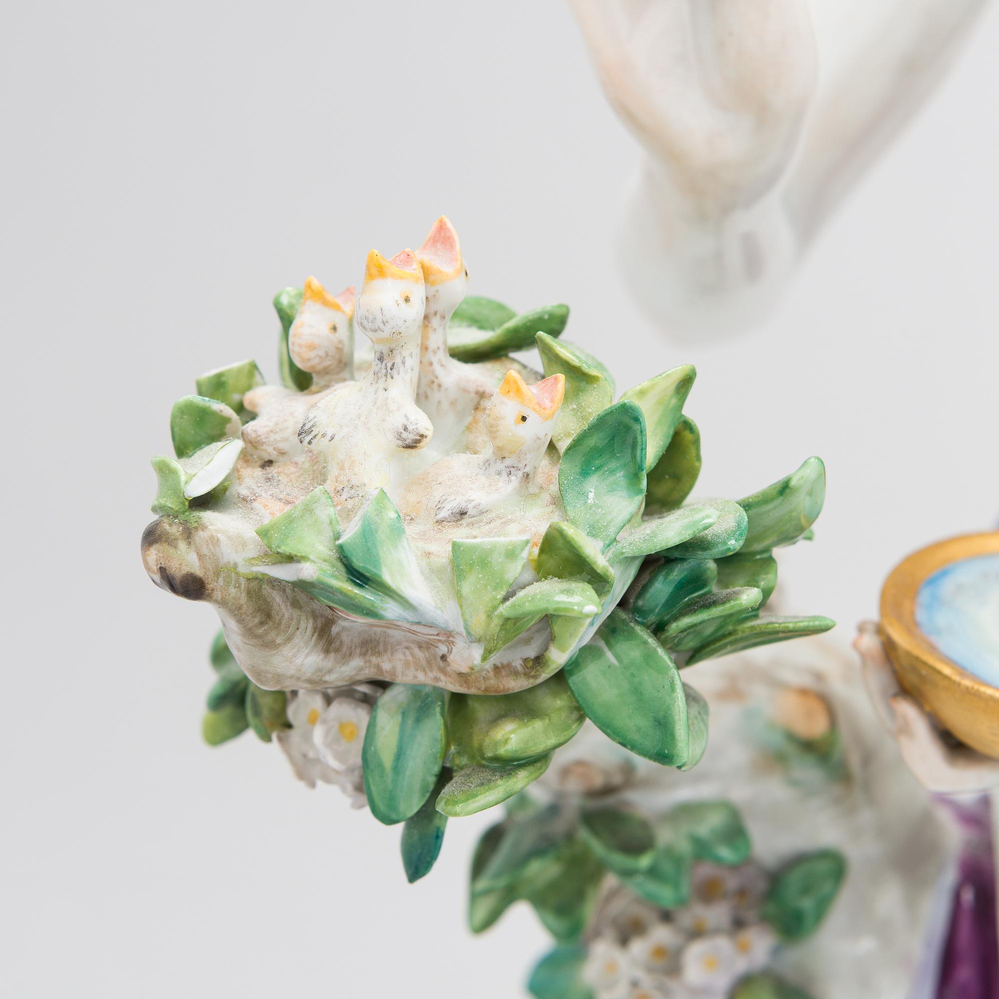 A Meissen Cupid porcelaine figure, 20th century.