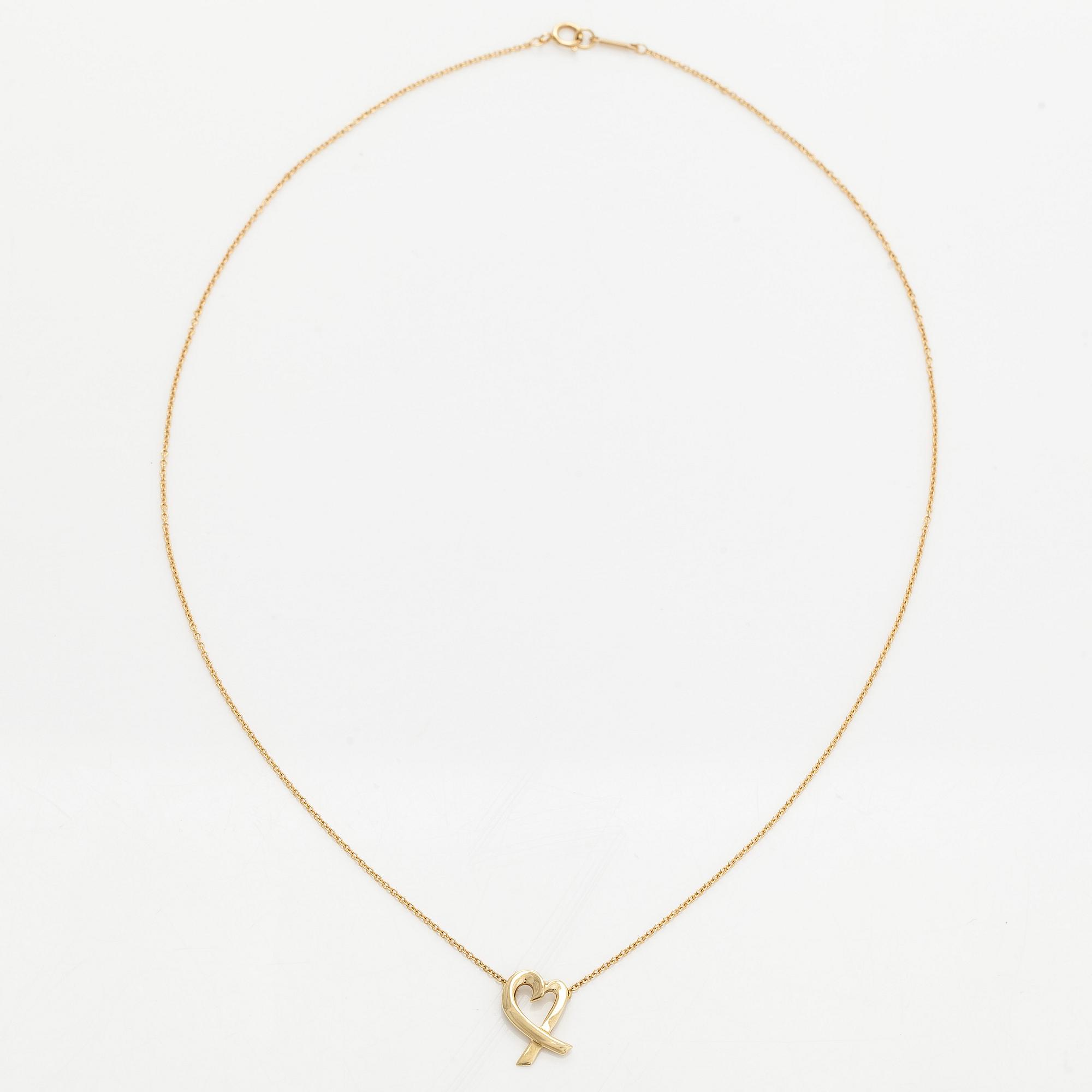Tiffany & Co, Paloma Picasso, an 18K gold "Loving Heart" necklace.