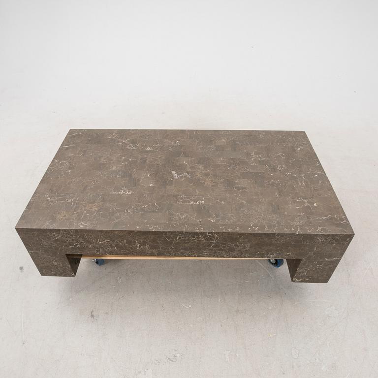 A late 20th century travertine coffee table.