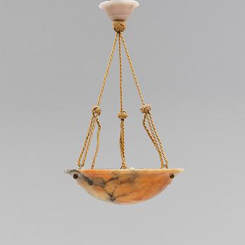 TAKAMPEL, alabaster, 1900-talets första hälft. Höjd ca 58 cm.