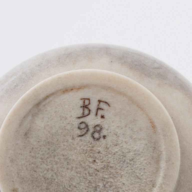 A small jar with lid made of engraved reindeer horn, by Bertil Fällman dated 98.