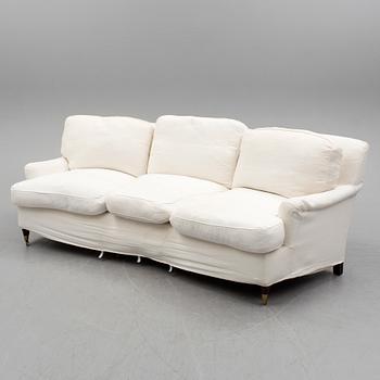 A contemporary Howard sofa.