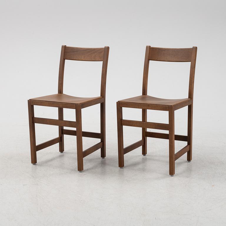 A pair of stained beech 'Waiter Chair' by Chris Martin for Massproductions.