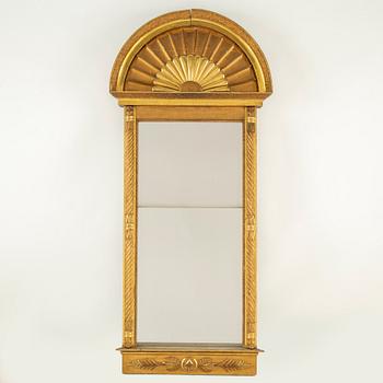 An Empire mirror from the first half of the 19th century.
