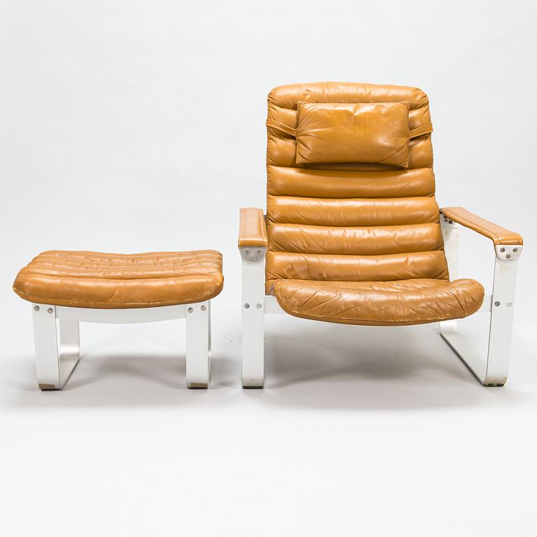 ILMARI LAPPALAINEN, a pair of 'Pulkka' lounge chairs with ottomans for , Asko, Finland.