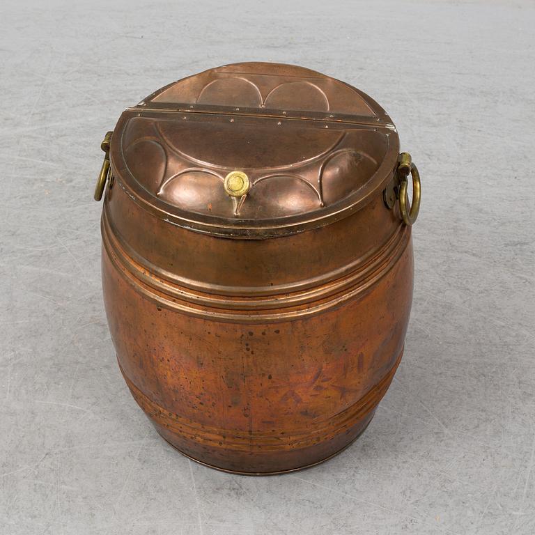 A 19th century copper water barrel.
