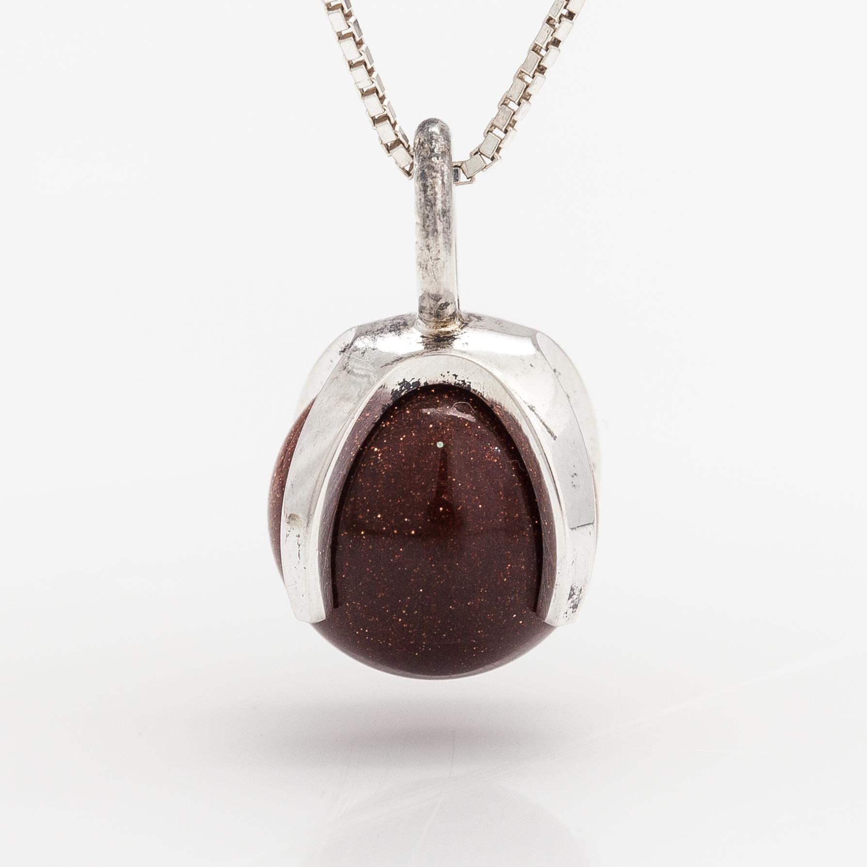 Elis Kauppi, A silver necklace with  a goldstone pearl. Kupittaan kulta, Turku.