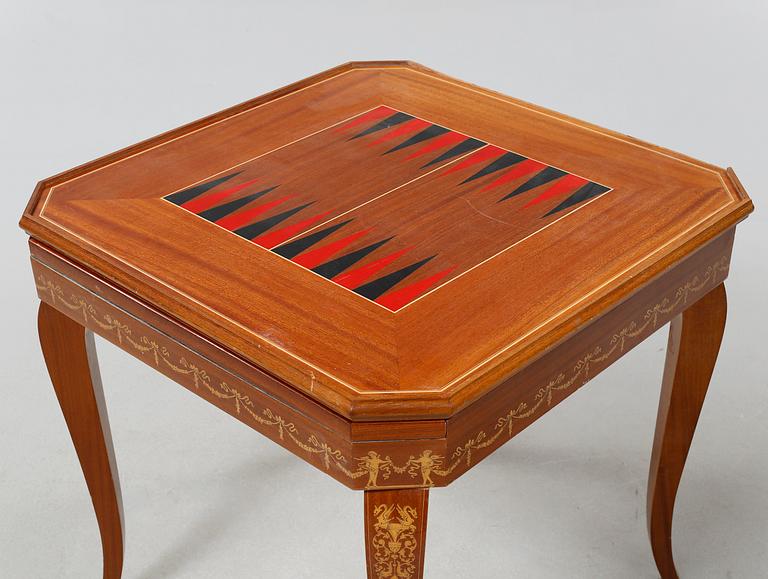 A gaming table and two chairs from Italy, 1950s.