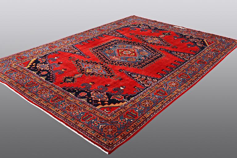 A CARPET, Wiss Signed Sharbani.  327 x 227 cm.
