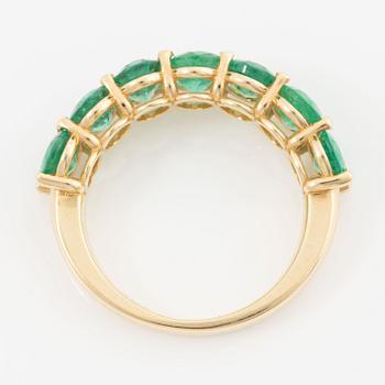 Ring, 18K gold with oval-cut emeralds.