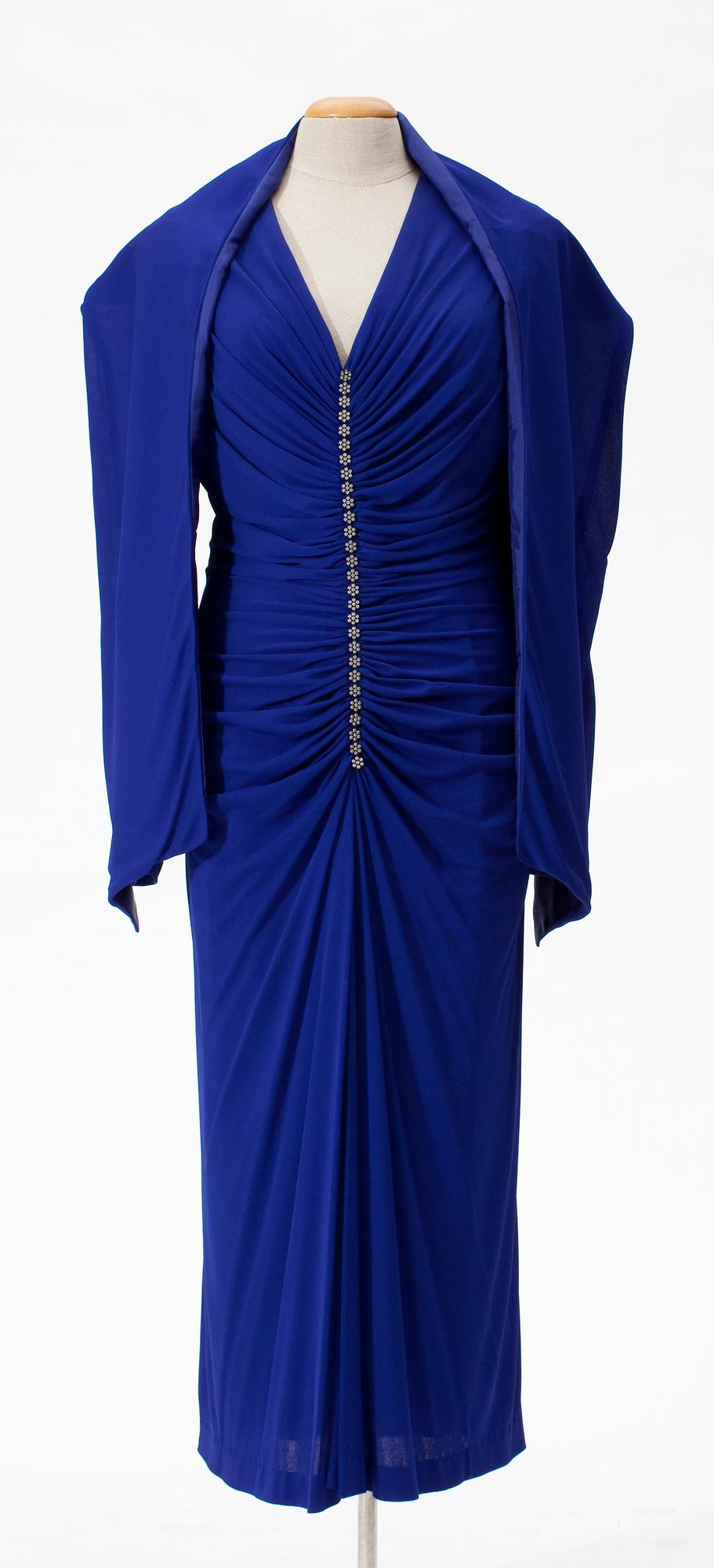 A 1980's cocktail dress with shawl.