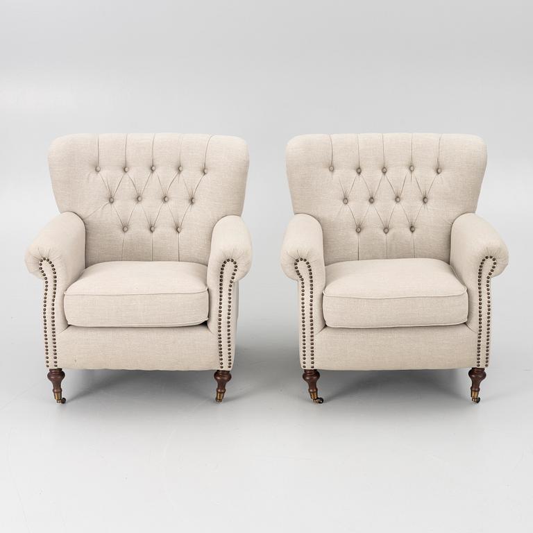 A pair of armchairs, early 21st century.