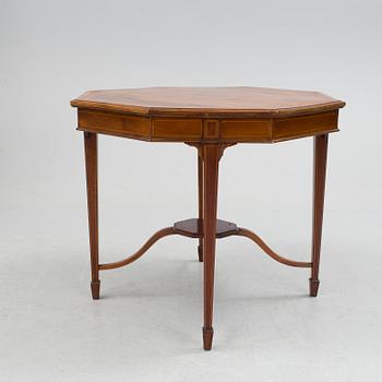 A 1920/30s Swedish Grace sofa, a pair of chairs, a pair of armchairs and a table veneered with mahogany.