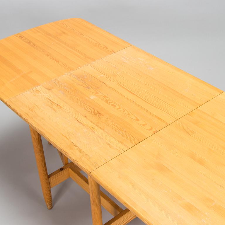 Eero Aarnio, A set of 6 "Pirtti" chairs and dining table for Laukaan Puu, Finland, late 20th century.