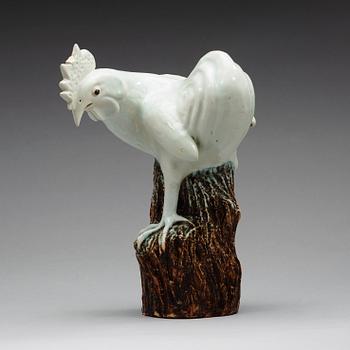 A white glazed figure of a rooster, Qing dynasty (1644-1912).