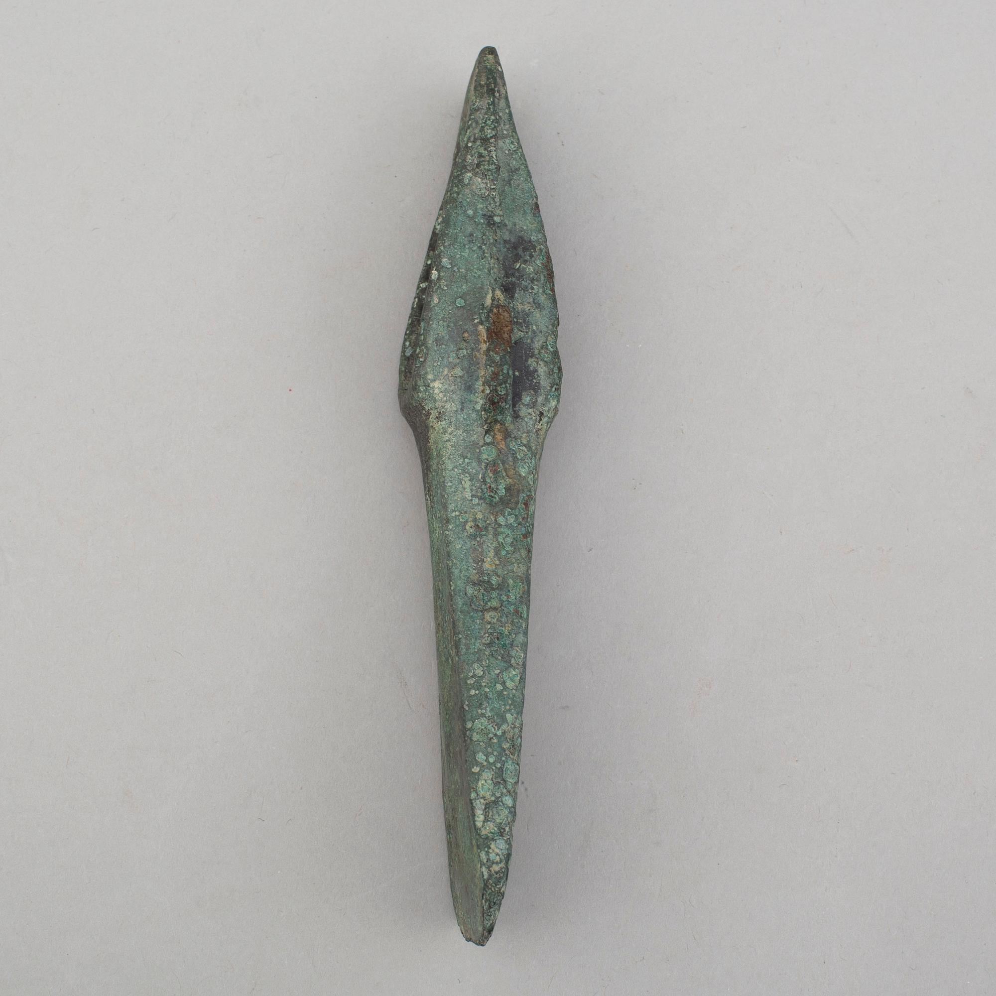 A bronze axe, 1500-500 B.C.