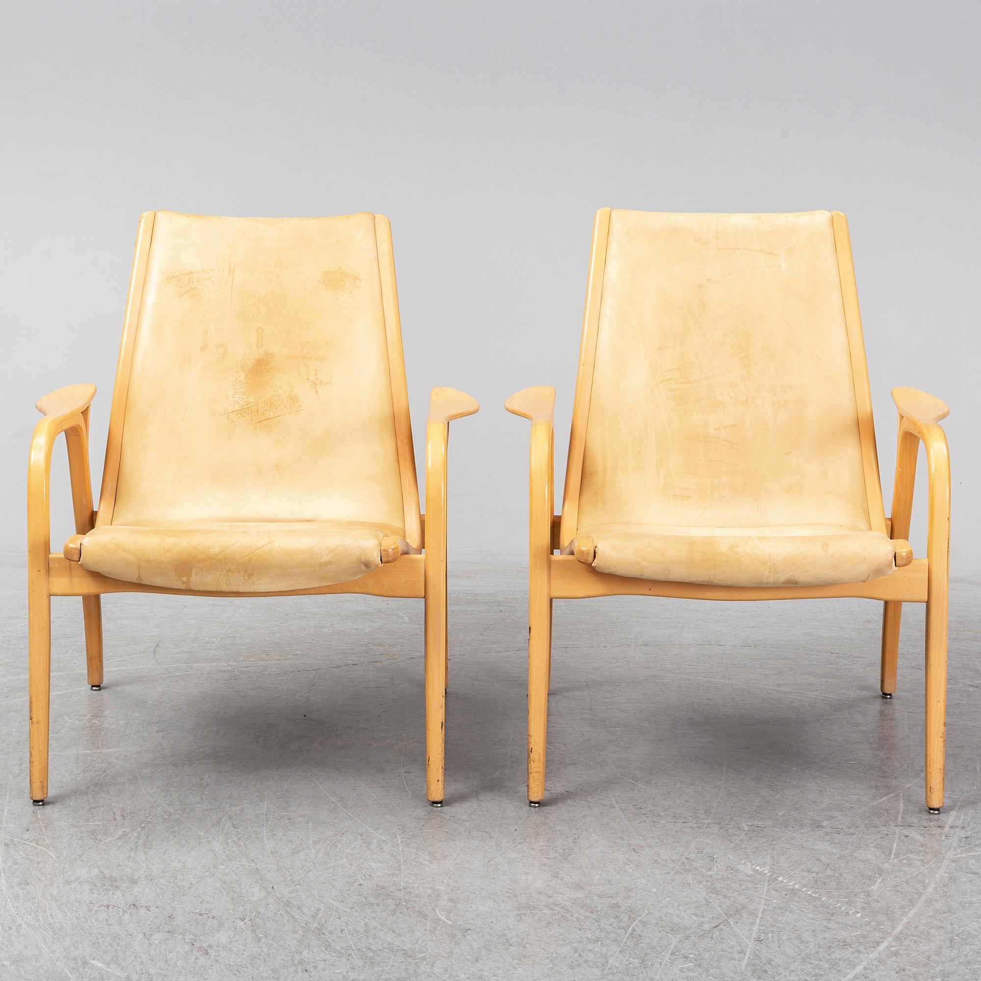 A pair of Laminett Yngve Ekström chairs.
