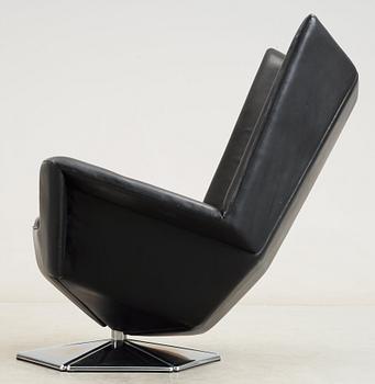 A Voitto Haapalainen black artificial leather and steel 'Prisma' easy chair, Tehokaluste Oy.