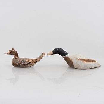 A set of six wooden duck decoys, 20th century.