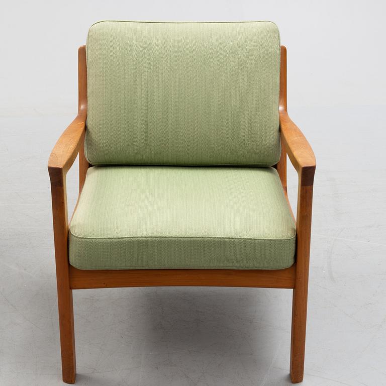 A pair of Ole Wanscher 'Senator' teak easy chairs, for France & Son, Denmark, second half of the 20th century.