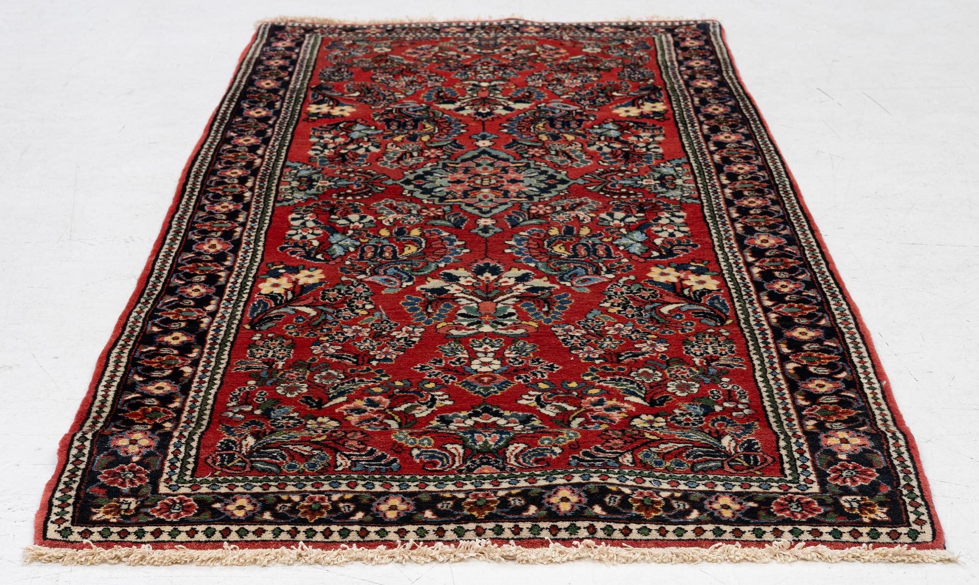 An Old Sarou runner, c. 193 x 84 cm.