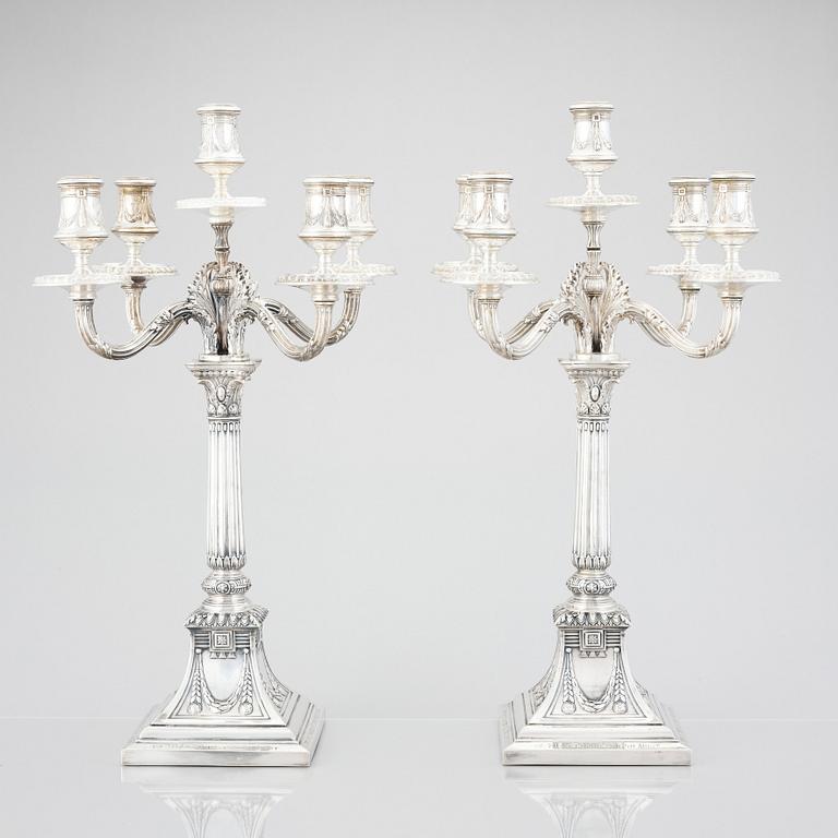 A pair of Swedish silver candelabras, mark of Svea Svensson, Stockholm 1908.