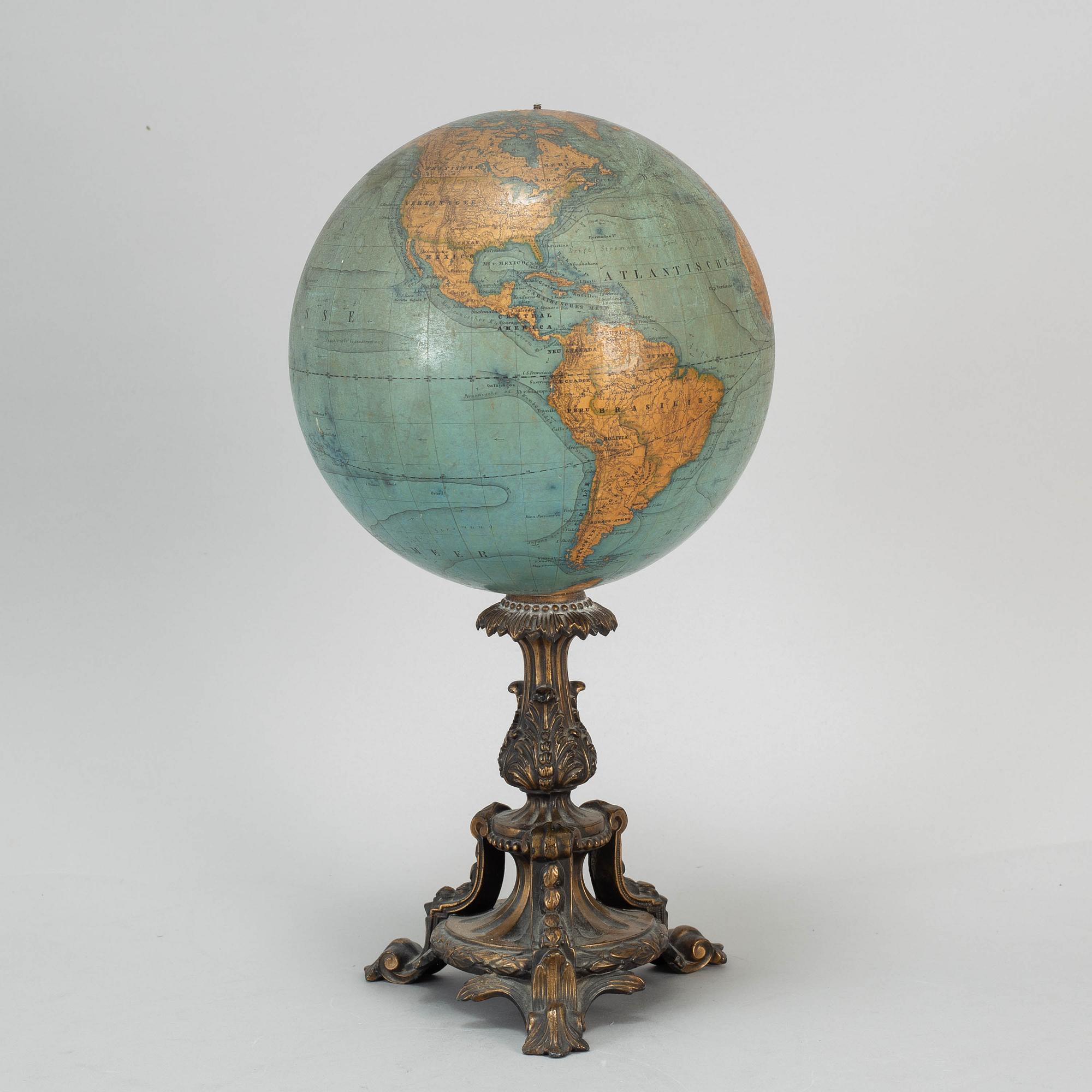 A miniature terrestrial globe, marked Adami Berlin Verlag von Dietrich Reimer 1856,