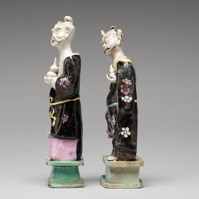 A pair of famille rose figures of 'Immortals', Qing dynasty, late 18th Century.