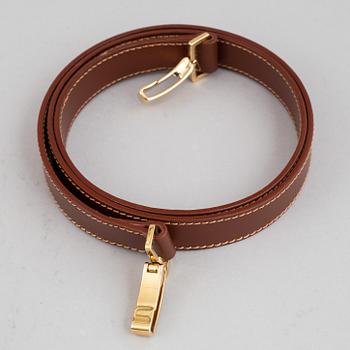 Burberry, a handbag and wallet.