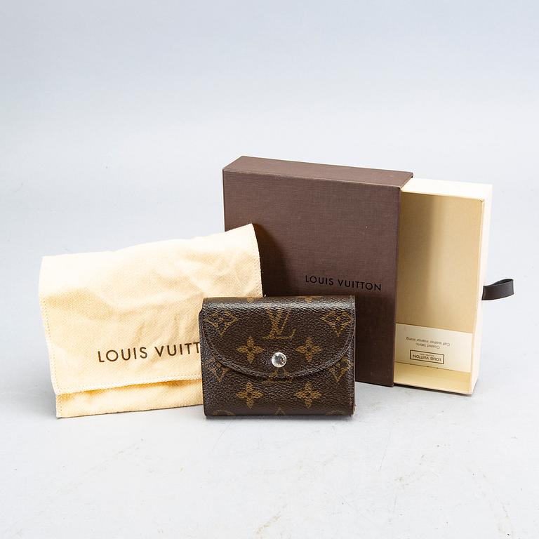 An 'Helene' wallet by Louis Vuitton.