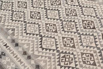 A Kelim carpet, 295 x 200 cm.