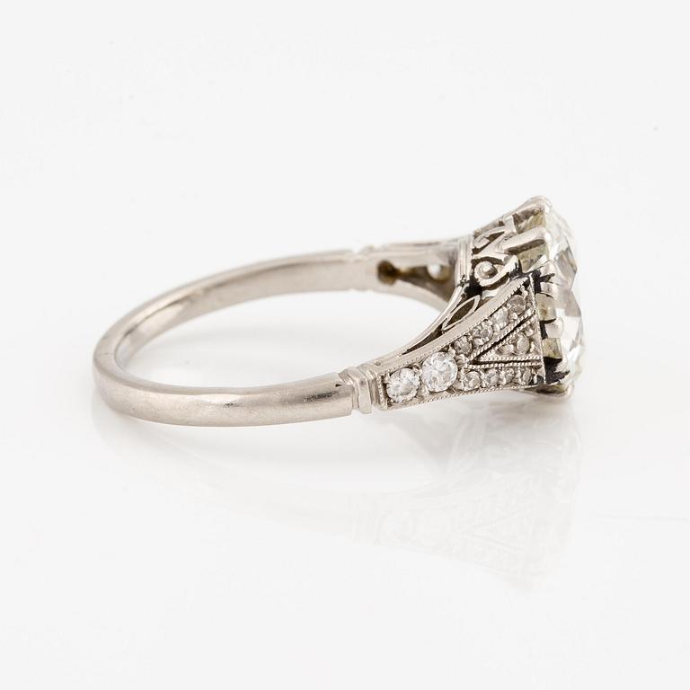 A platinum ring set with an old-cut diamond.