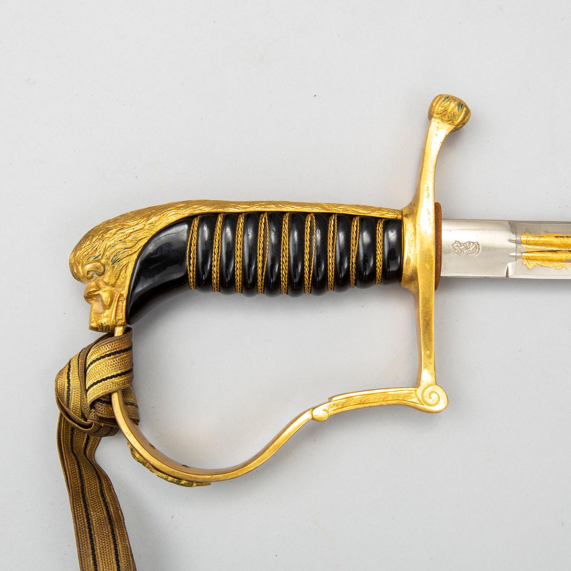 A Swedish infantry officers sword 1899 pattern with scabbard.