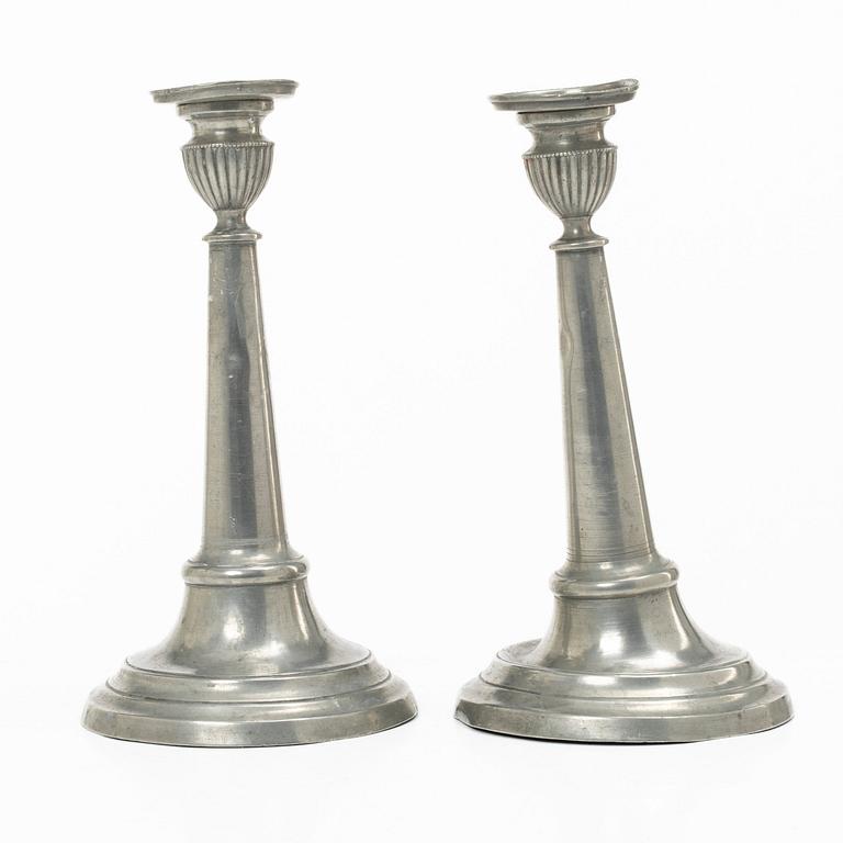 A pair of pewter candle sticks, Sweden, possibly 1844.