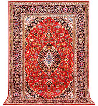 A Kashan carpet, a. 305 x 200 cm.
