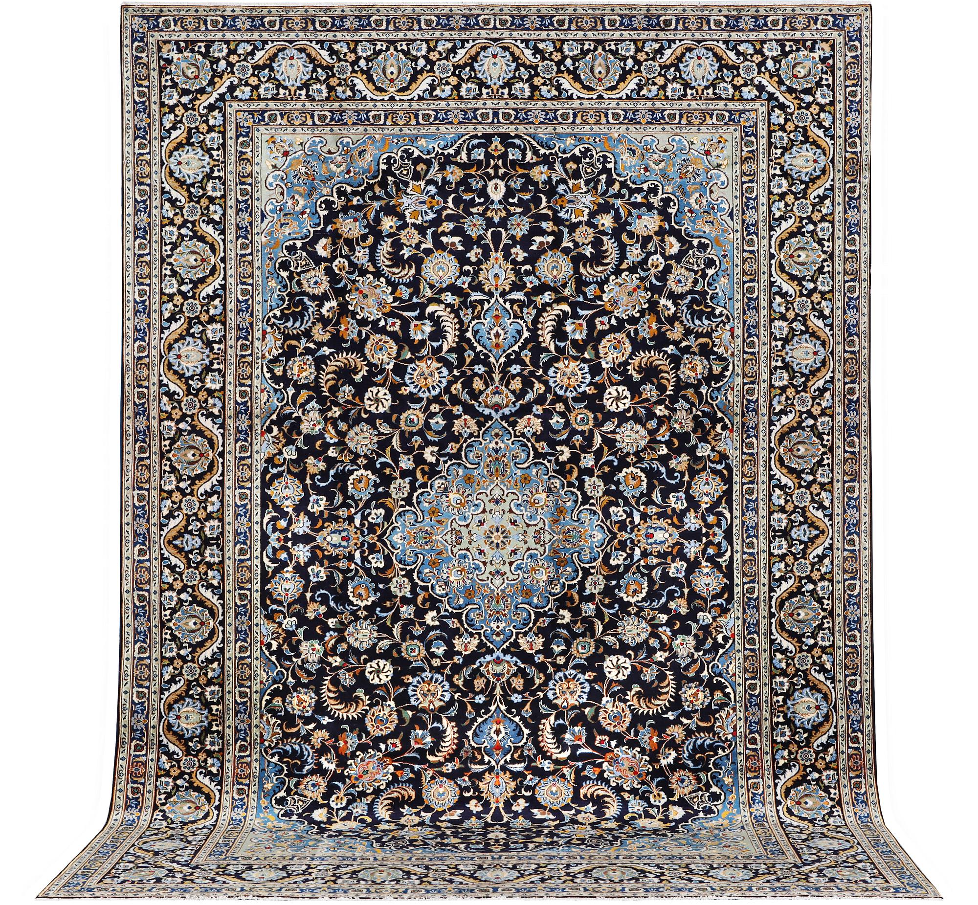 A Kashan carpet, c. 393 x 271 cm.