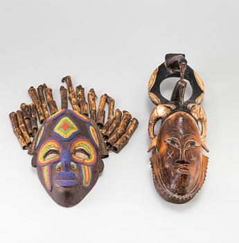 Two 20th century African wooden masks.