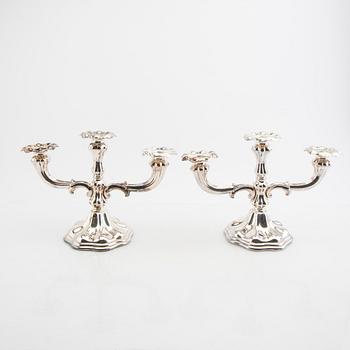 A Swedish 20th century pair of silver candelabras mark of CG Hallberg Stockholm 1935.