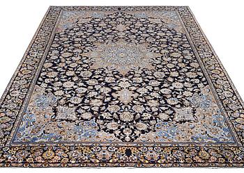 A Kashan carpet, c. 430 x 293 cm.