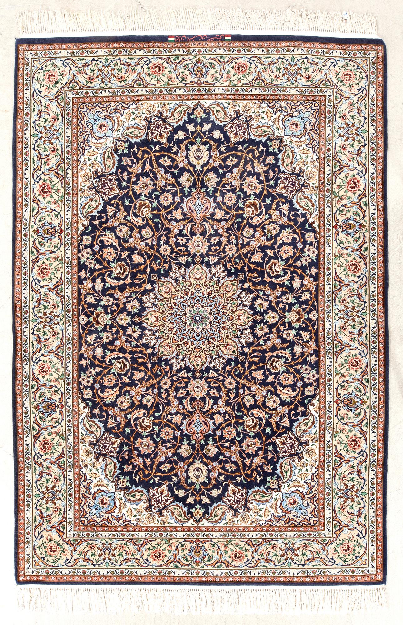 An old isfahan carpet signed part silk approx 223x146 cm.