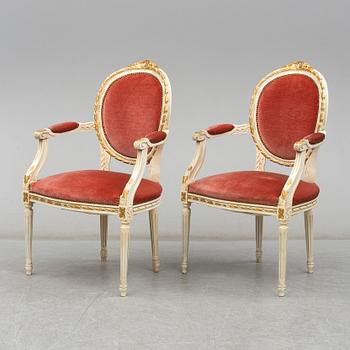 A pair of mid 20th century Gustavian style armchairs.