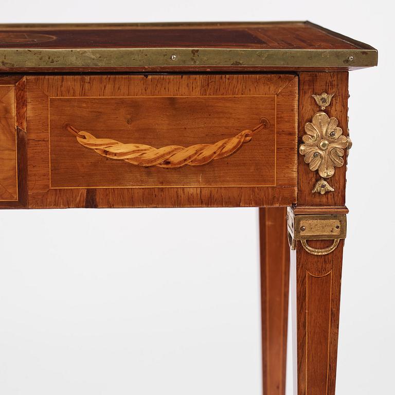 A Gustavian marquetry and gilt brass-mounted table by G. Iwersson (master in Stockholm 1778-1813).