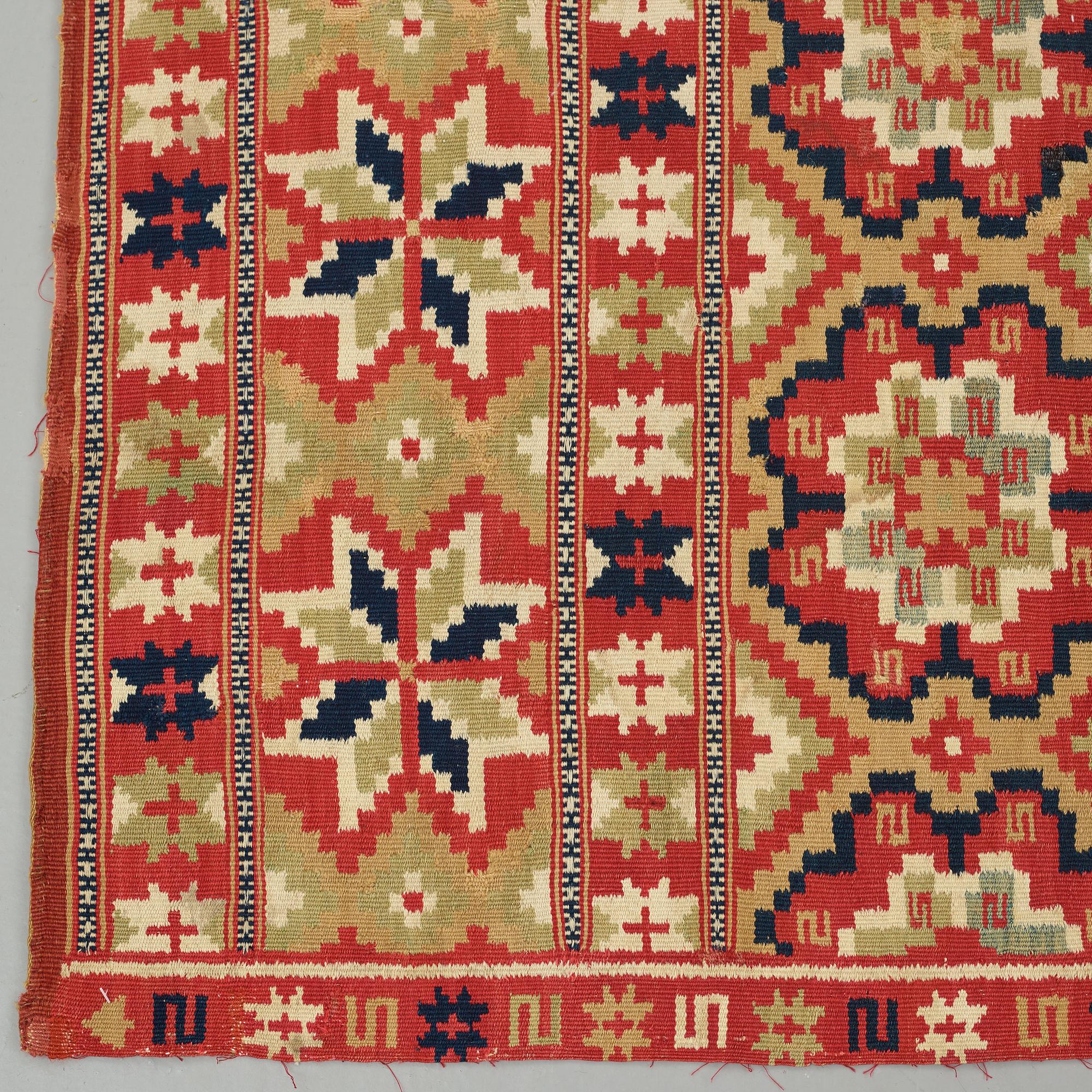 A BED COVER, double-interlocked tapestry, ca 197 x 117,5 cm, Scania (Skåne)1810, probably Gärds or Villands district.