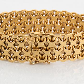 Armband, 18K guld, tät x-länk.